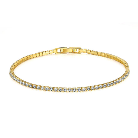 Gold bracelet with clear stones on a white background
