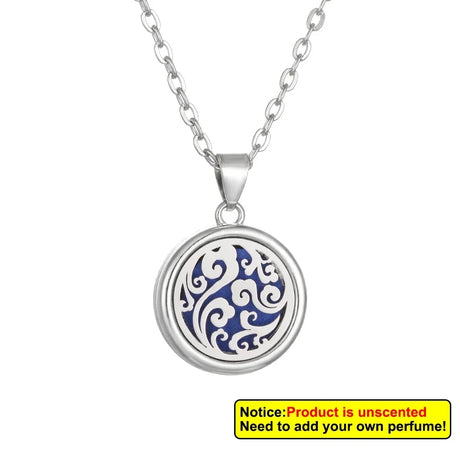 Silver necklace with a round pendant featuring blue and white designs on a white background.