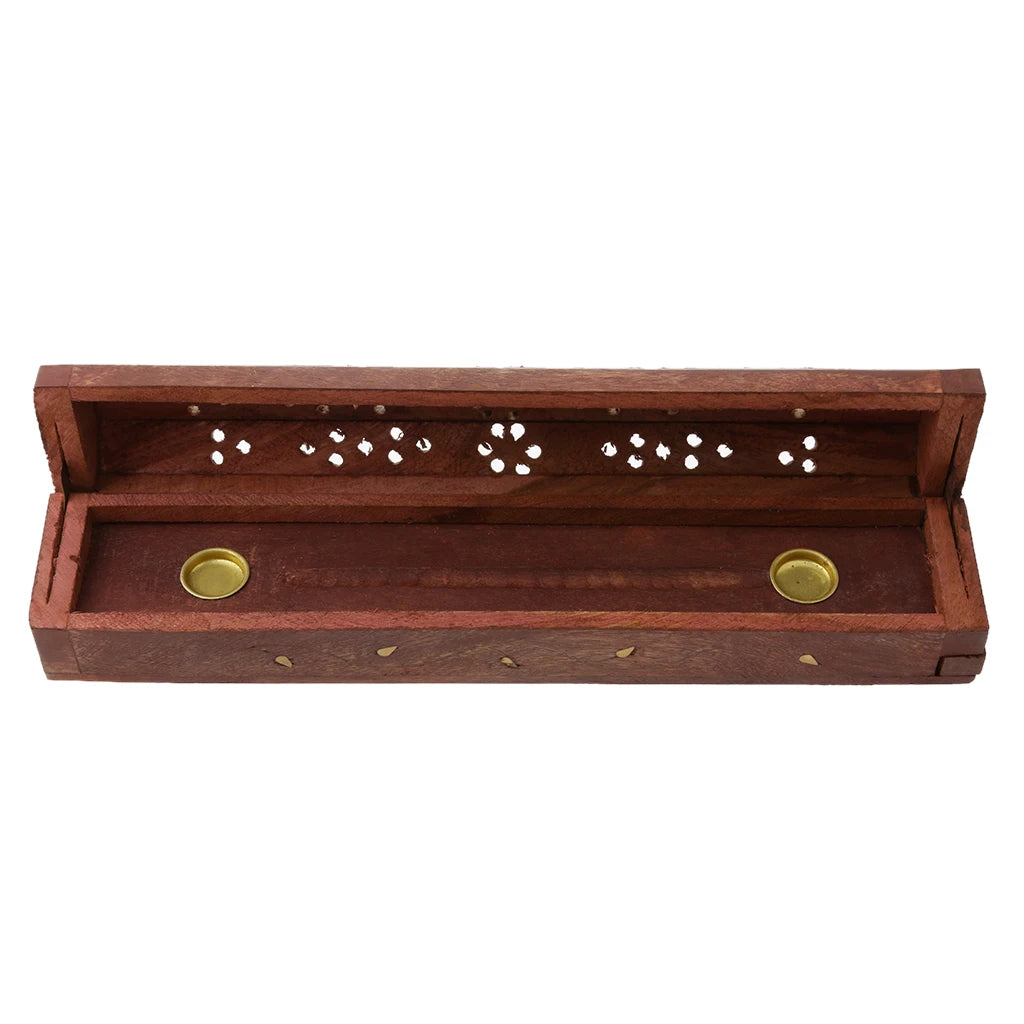 Wooden incense box with two gold-colored incense sticks on a white background
