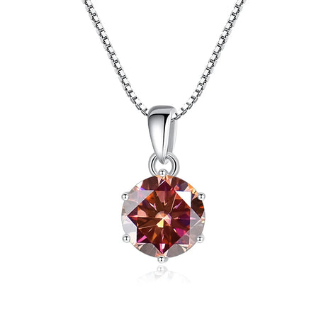 Diamond necklace with a red gemstone on a white background