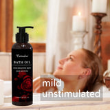Catindra bath oil bottle with a woman relaxing in the background