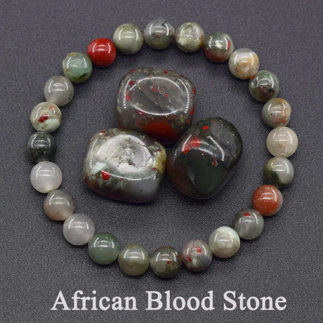 African Blood Stone bracelet with stones on a dark background