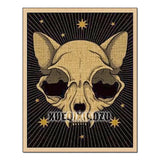 Poster with a dog skull design on a black background with gold accents, featuring the brand 'Xero'.