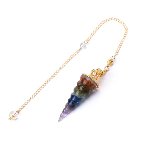 Crystal pendulum with gold chain on a white background
