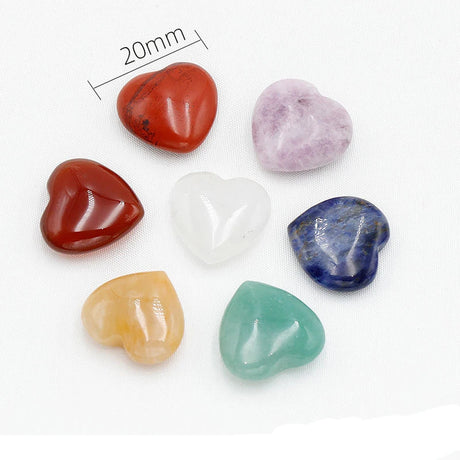 Set of heart-shaped stones in various colors on a white background with a measurement label.