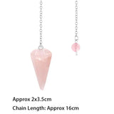 Pink crystal pendant on a chain with measurements displayed