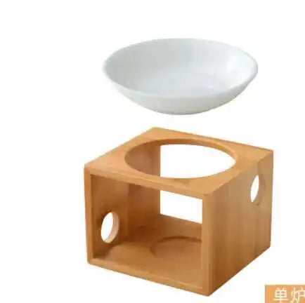 White ceramic bowl on a wooden stand with a white background