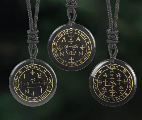 Three circular pendants with intricate designs on a dark background, featuring the brand 'VGDS'.