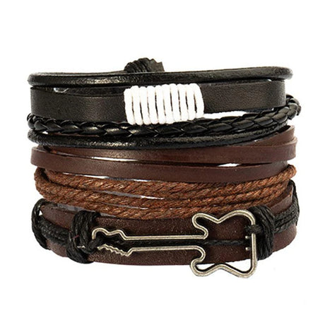 Stack of leather bracelets with metal clasp on a white background