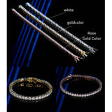Bracelets in white, gold color, and rose gold color on a dark background.