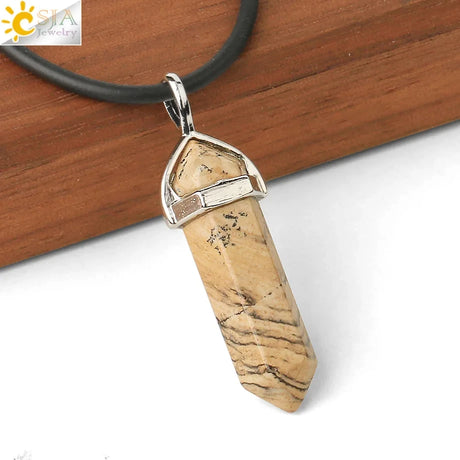 Necklace with a stone pendant on a wooden surface