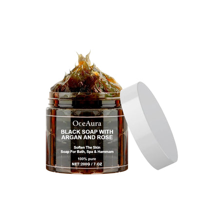 Jar of black soap with argan and rose from OceAura on a white background