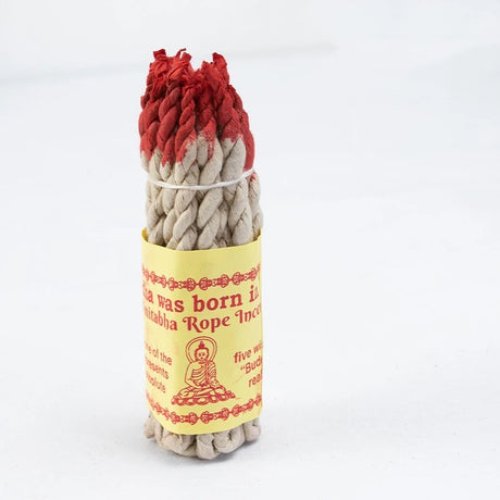 Rope incense with a yellow label on a white background