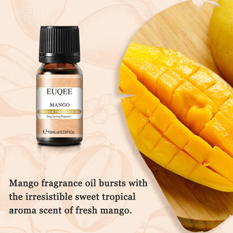 EUQEE Mango fragrance oil bottle with sliced mangoes on a wooden board