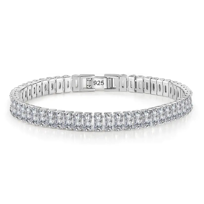 Silver bracelet with clear stones on a white background