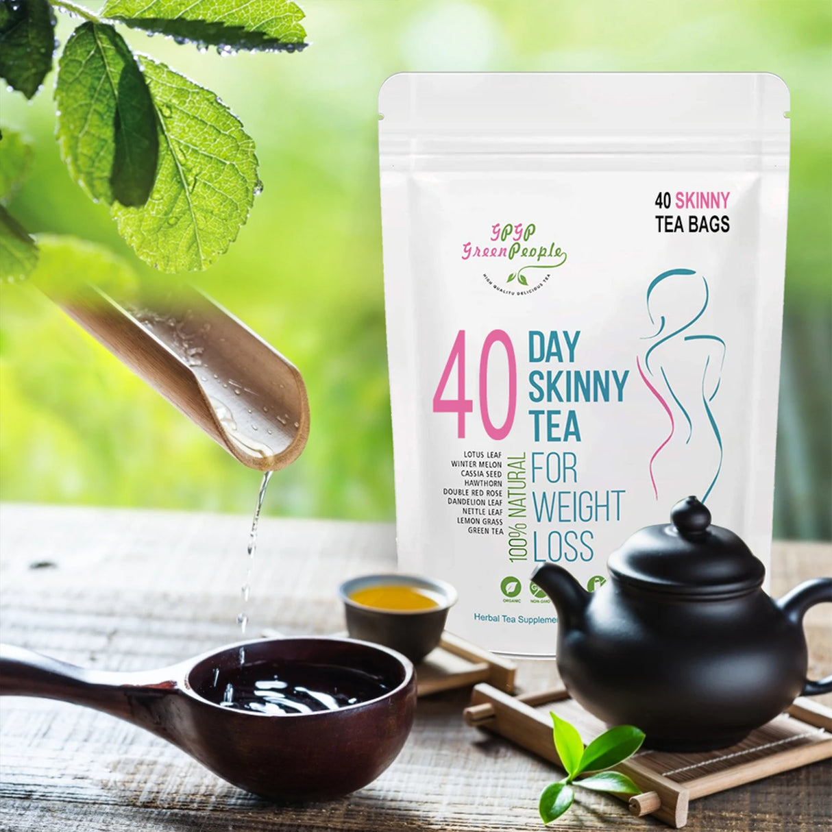 40 Day Skinny Tea package with a teapot and tea leaves on a wooden table