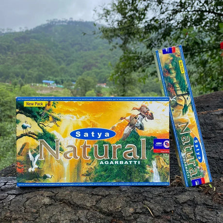 Satya Natural Agarbatti packaging with incense sticks against a natural background