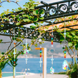 Decorative hanging chains with beads and crystals against a scenic background