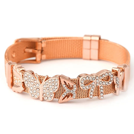Rose gold dog collar with decorative elements on a white background