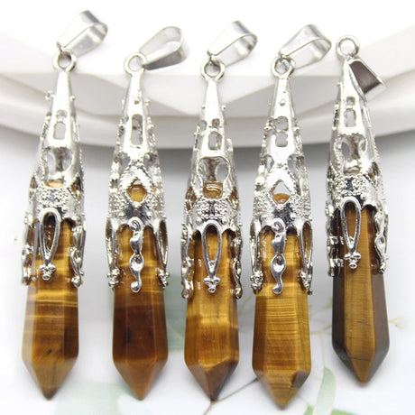 Five tiger eye pendants with silver tops on a white background