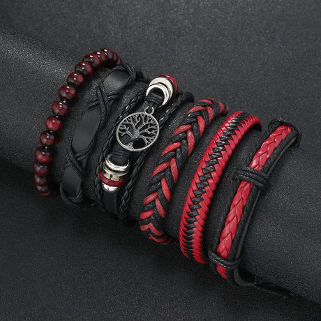 Collection of leather and beaded bracelets on a dark background
