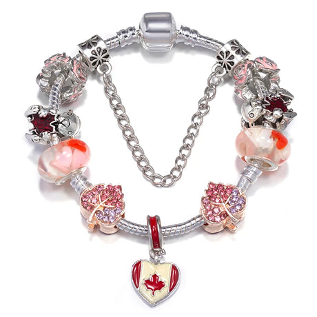 Silver bracelet with colorful charms on a white background