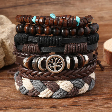Stack of various bracelets on a wooden surface