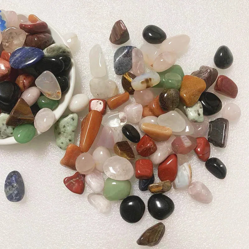 Assorted colorful stones on a white background