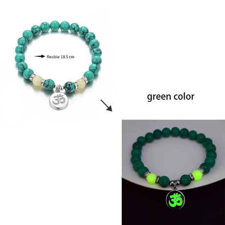 Turquoise and green beaded bracelets with Om symbol on a white background