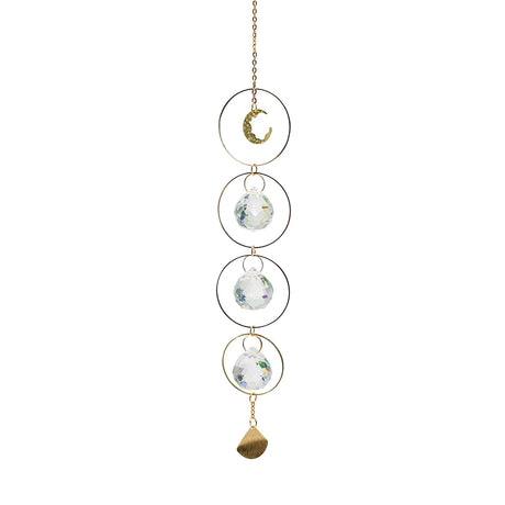 Decorative hanging chain with crystal balls and a moon charm on a white background