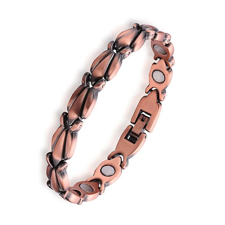 Copper bracelet with magnetic elements on a white background