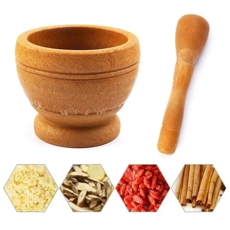 Wooden mortar and pestle with images of spices below on a white background