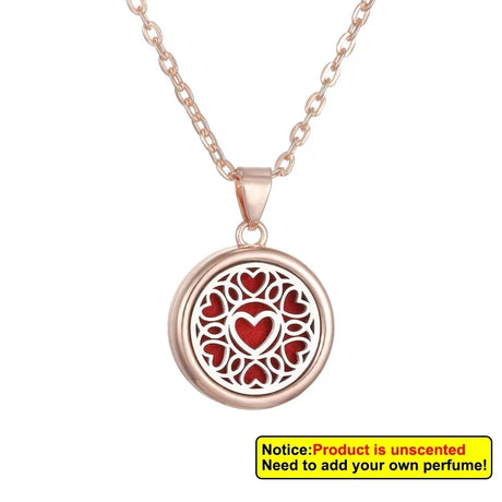 Rose gold necklace with a heart design pendant on a white background