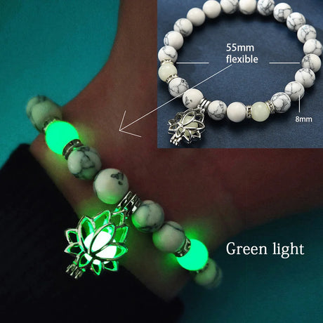 Glowing green beaded bracelet with lotus charm on a hand, showing flexibility and size details.