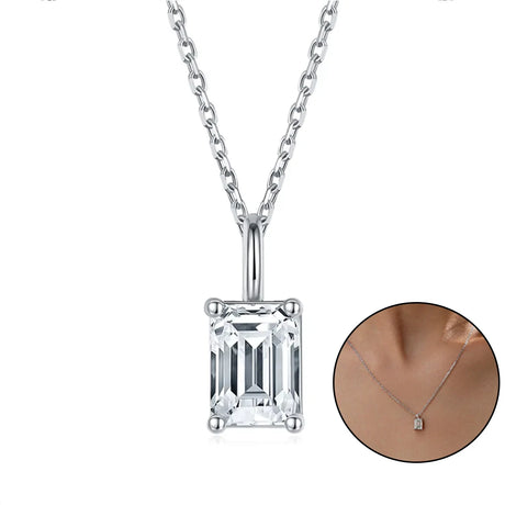 Diamond necklace with emerald-cut pendant on a white background