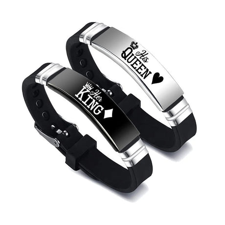 Two black and silver bracelets with 'King' and 'Queen' text on a white background