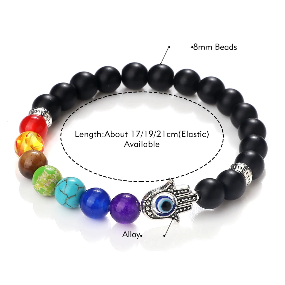 Black beaded bracelet with colorful beads and an evil eye charm on a white background