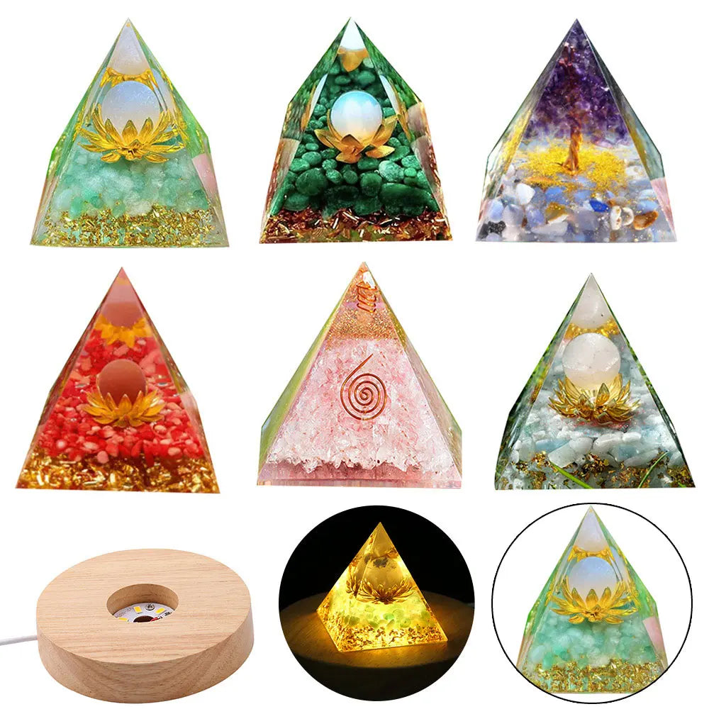 Set of six pyramid-shaped crystal lights with various designs on a white background.