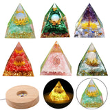 Set of six pyramid-shaped crystal lights with various designs on a white background.