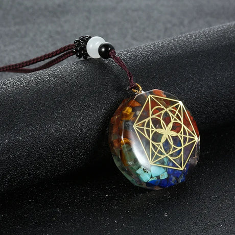 Pendant with geometric design on a dark surface