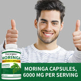 Man giving a thumbs-up with a bottle of Tecepec Moringa capsules on a gray background