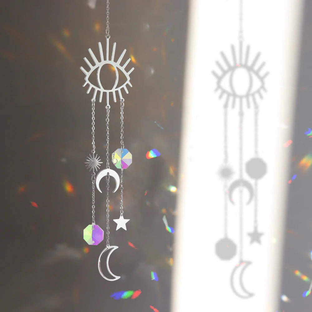 Decorative hanging with celestial symbols on a dark background