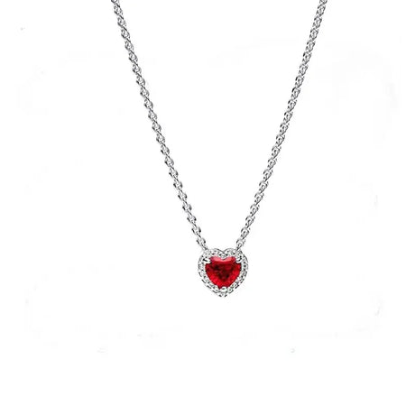 Heart-shaped red gemstone necklace on a white background