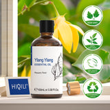Ylang Ylang essential oil bottle with HIQILI branding on a natural background