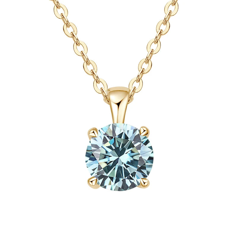 Gold necklace with a round gemstone pendant on a white background