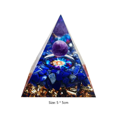 Triangular crystal with purple sphere and blue stones on a white background