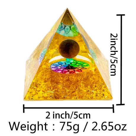 Pyramid-shaped object with a colorful center and measurements on a white background