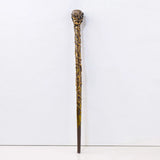 Decorative walking stick with intricate design on a white background