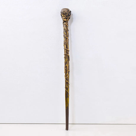 Decorative walking stick with intricate design on a white background