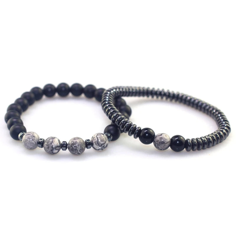 Set of three beaded bracelets on a white background